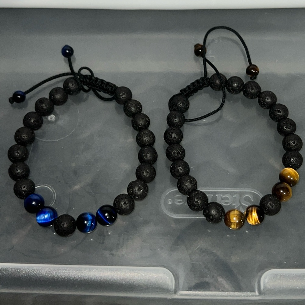 2 Rope style bracelets with lava stone beads and 1 blue and 1 brown color bead